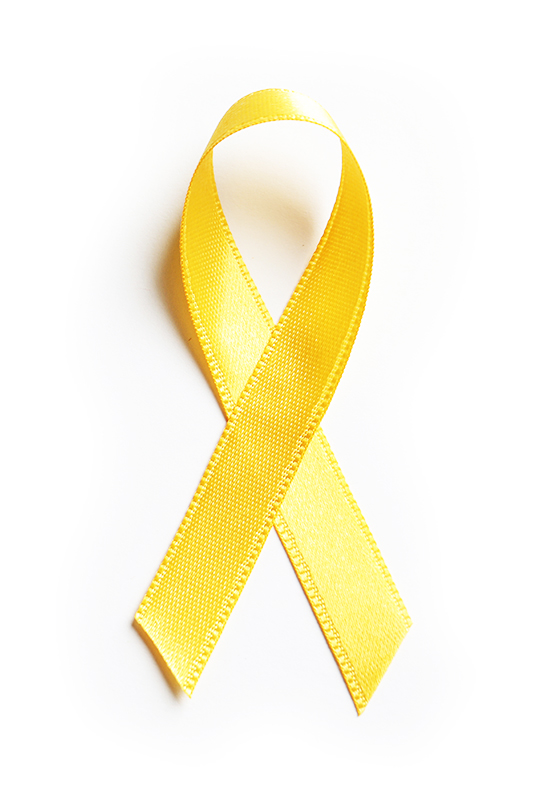 Yellow ribbon on white background, top view. Cancer awareness